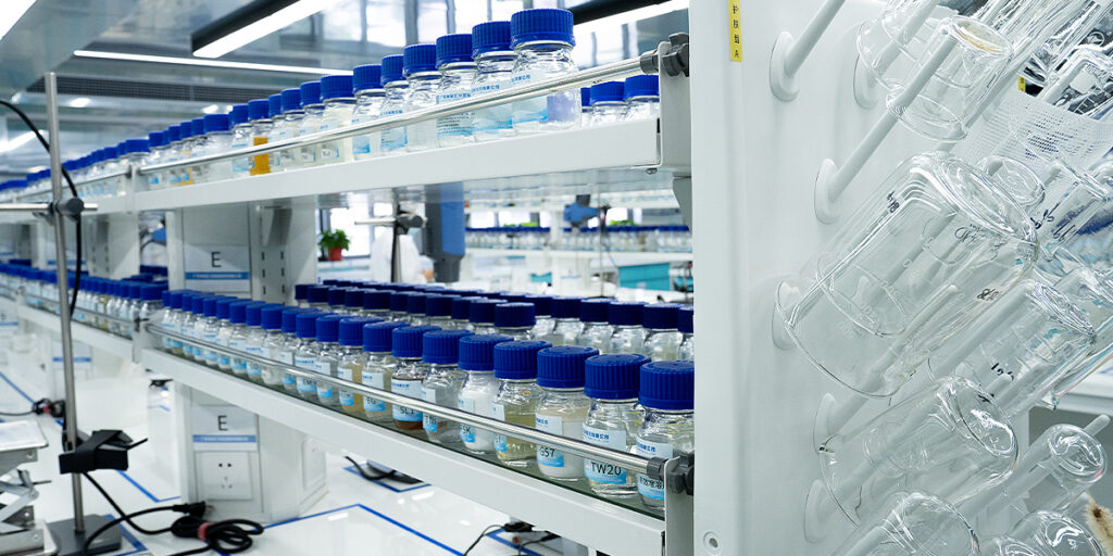 Laboratory-scale OEM whitening formulation samples arranged for stability and compatibility testing on oil-acne skin