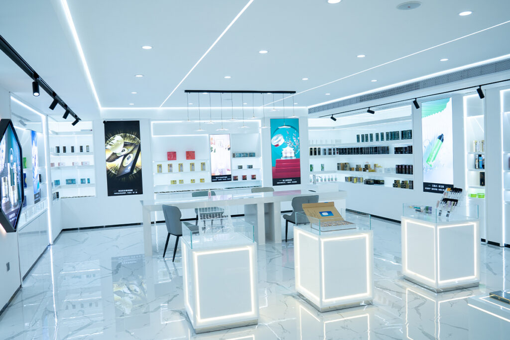 Modern skincare OEM showroom displaying product samples and packaging options for brand development and quotation discussion.