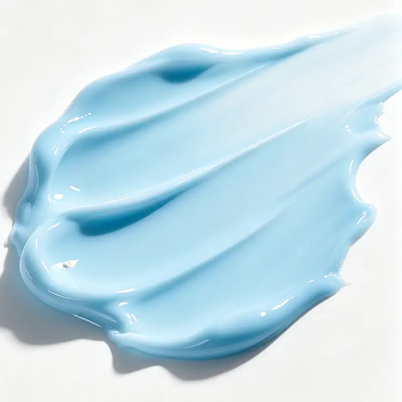 Blue polypeptide cream texture showing a rich skincare formula for anti-aging repair, hydration, and barrier comfort