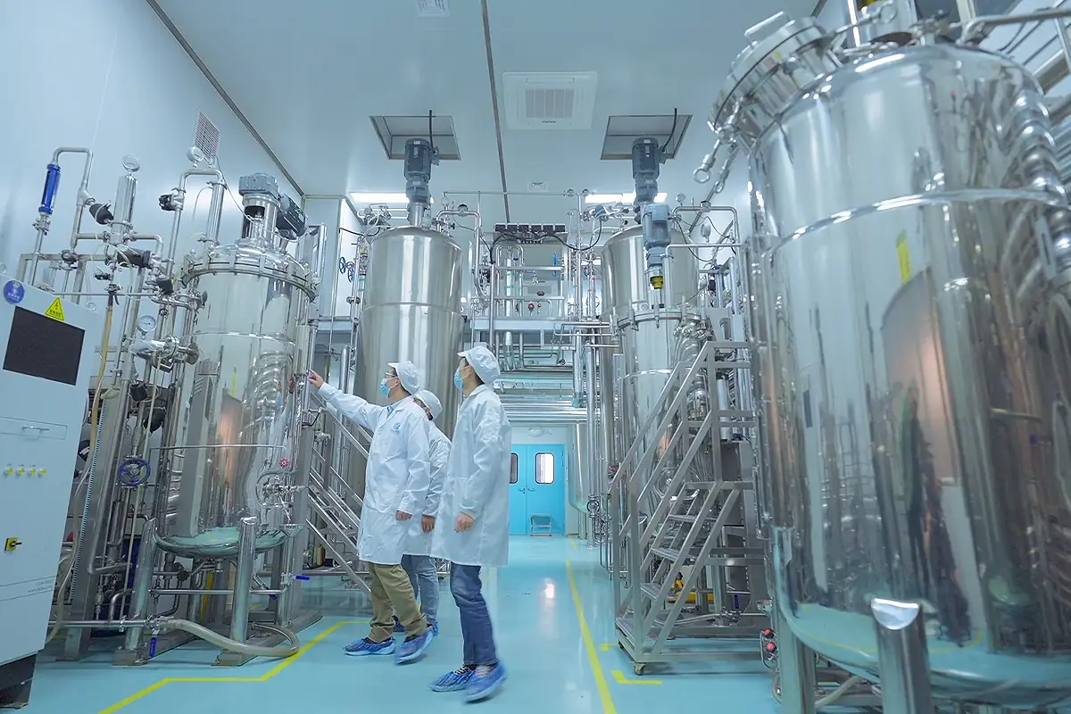 Shangpinhui Biotechnology cosmetic manufacturing workshop with stainless steel production tanks for private label hair care OEM projects