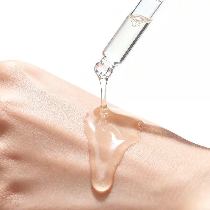 Lightweight water based peptide hair growth serum texture applied from dropper without oily buildup